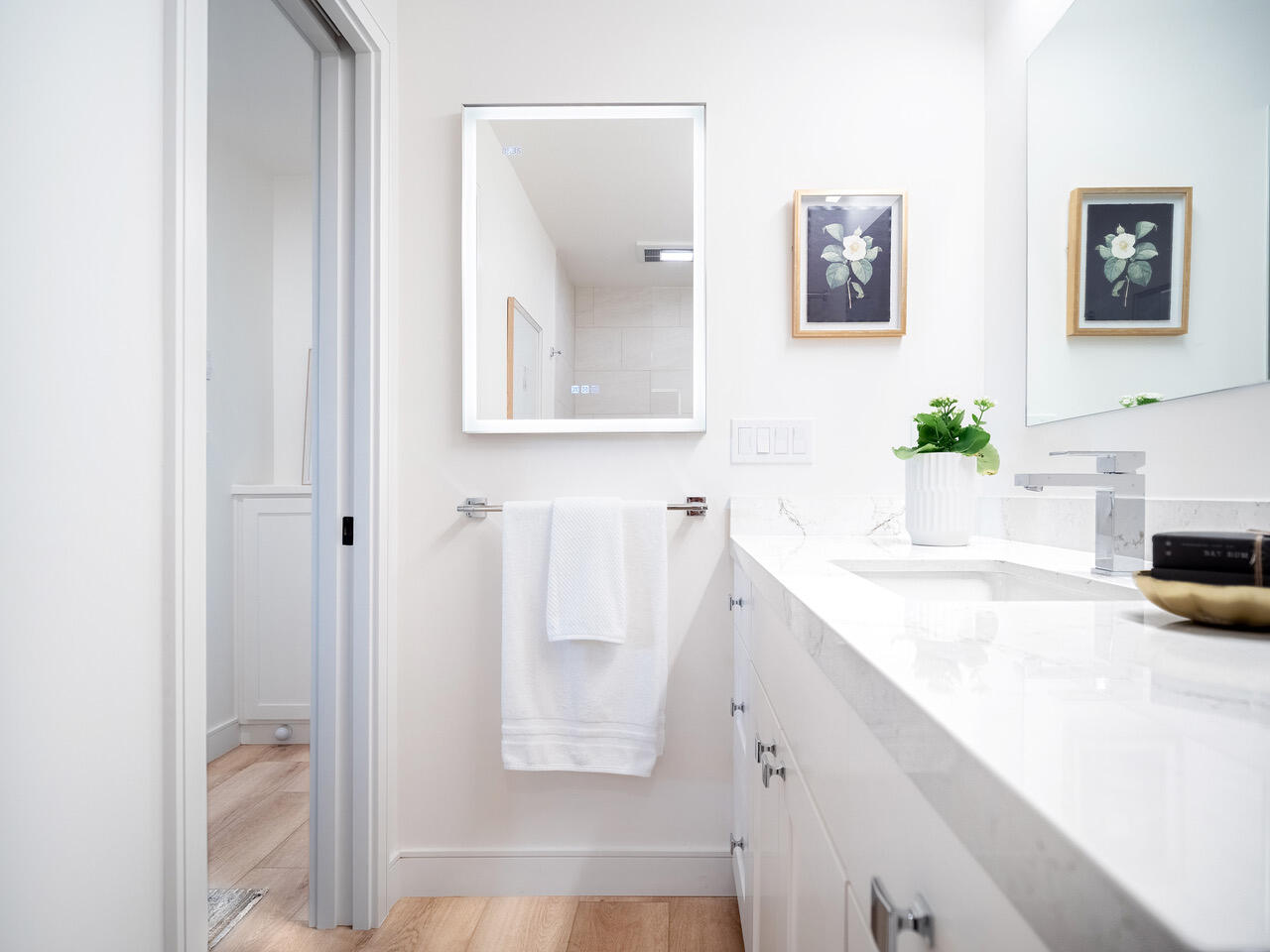 3375 Foothill Road, Unit 514 Carpinteria, CA 93013 - Photo 13 of 24 a bathroom with a sink a mirror and a shower