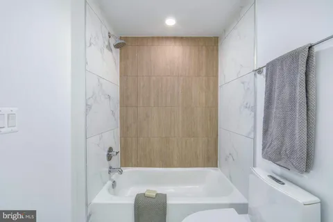 a view of a building with sitting area