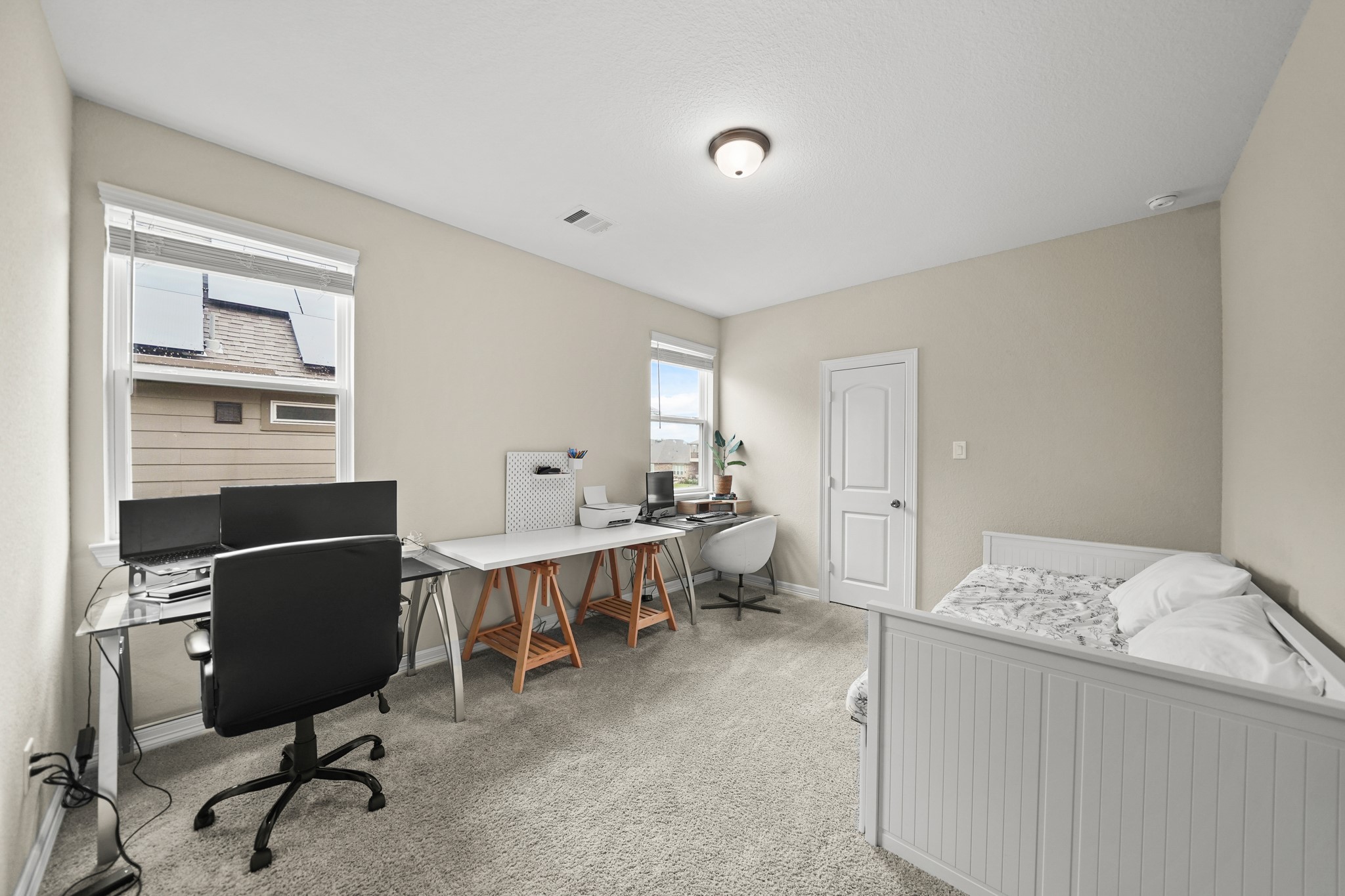 24031 Corinaldo Court Katy, TX 77493 - Photo 18 of 23 a view of a workspace with furniture