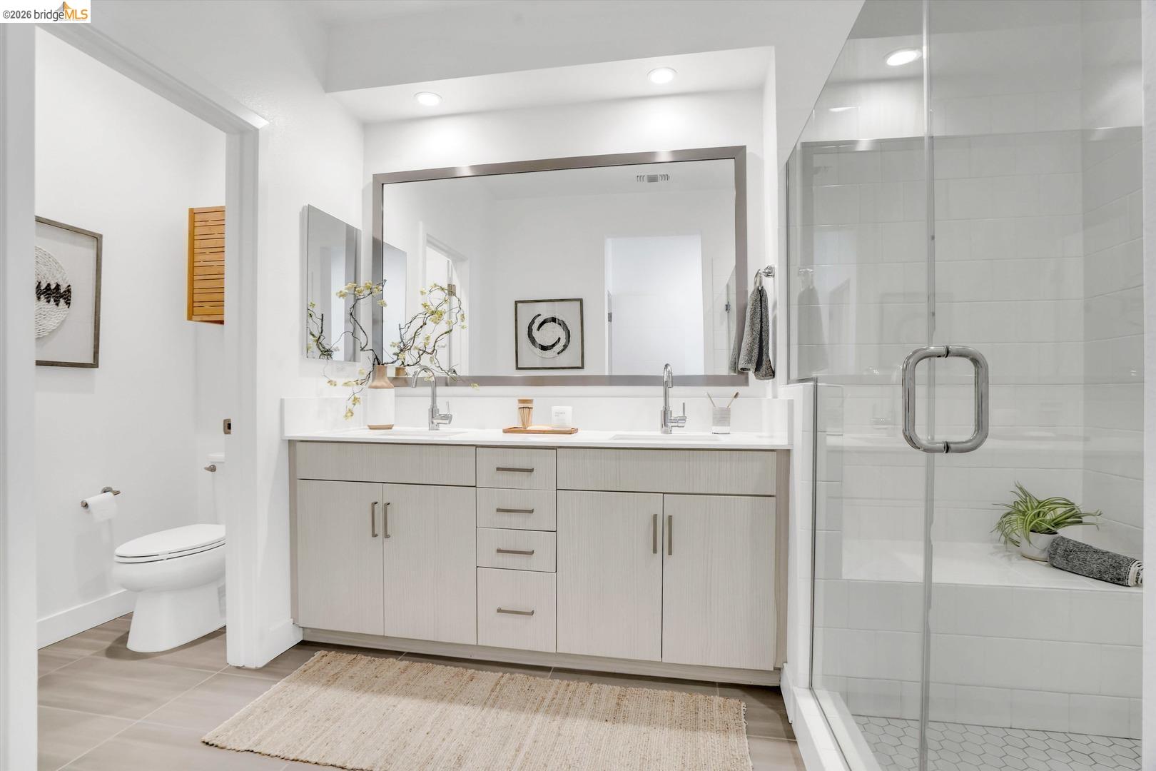 2229 Myrtle Street Oakland, CA 94607 - Photo 22 of 37 bathroom featuring double vanity and a stall shower