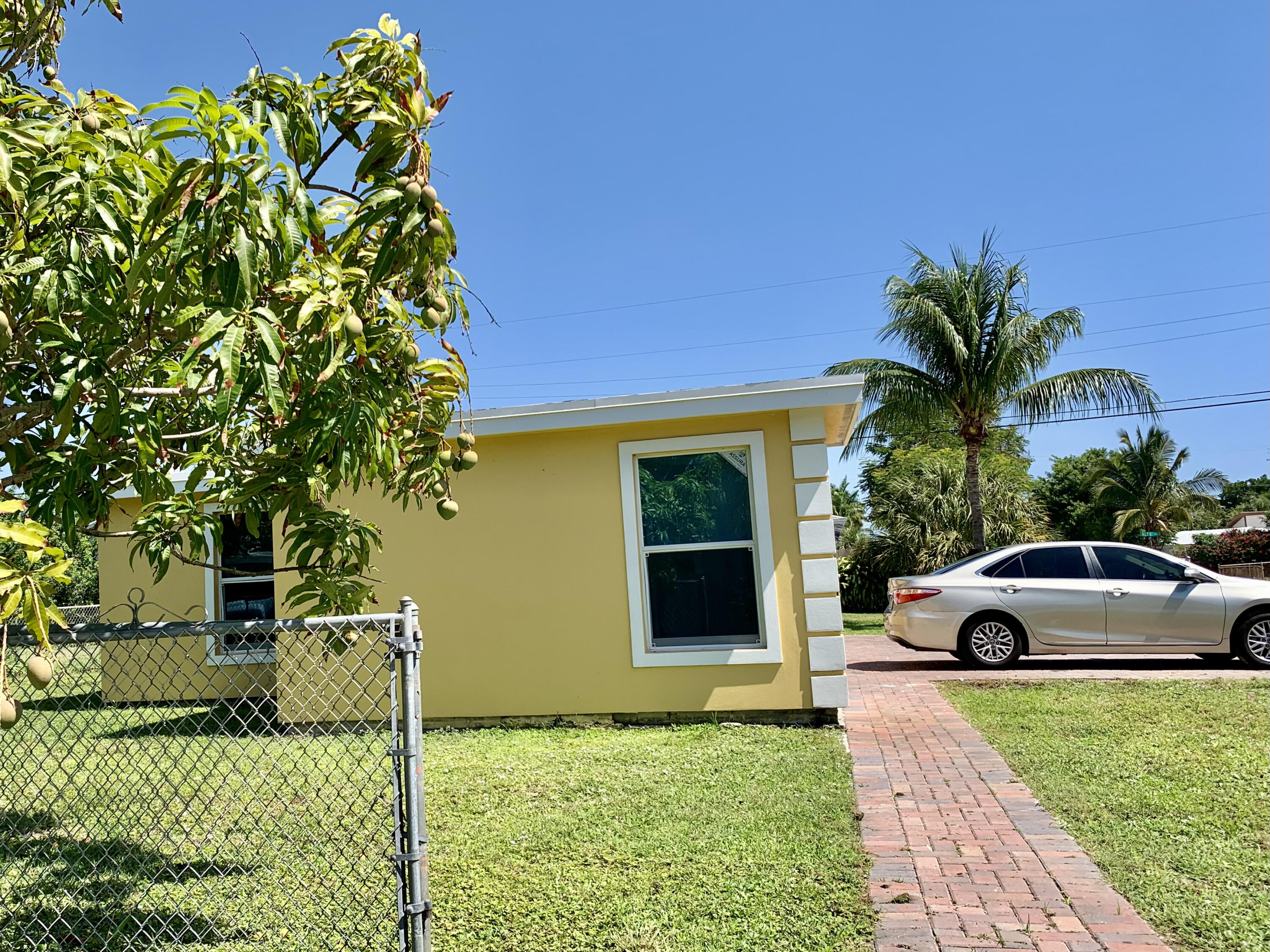 1125 Peak Road Lake Worth, FL 33462 - Photo 5 of 23 From south side