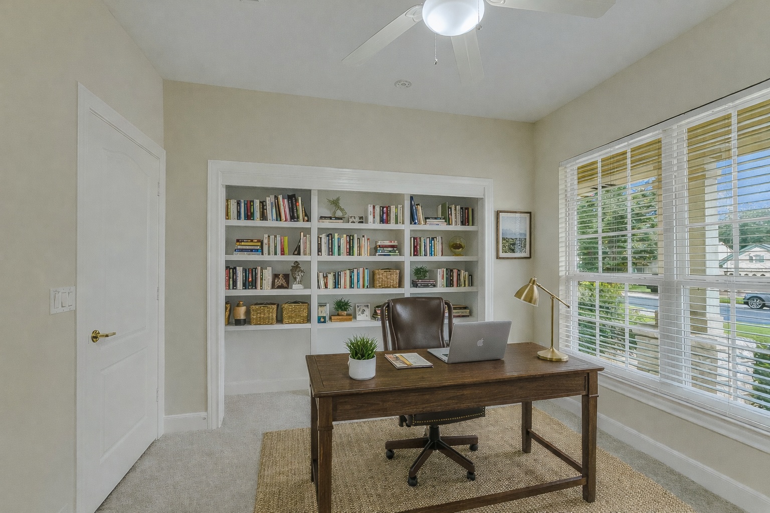 603 Rio Grande Loop Georgetown, TX 78633 - Photo 22 of 27 Home office with light carpet and ceiling fan