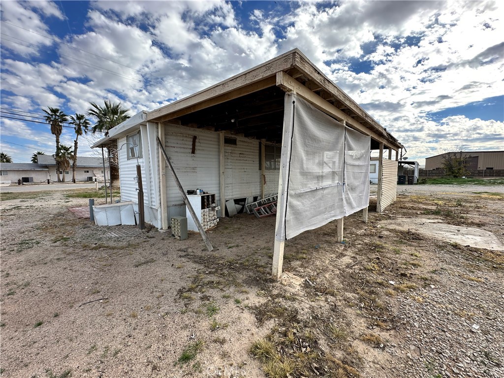1609 Riviera Drive Blythe, CA 92225 - Photo 11 of 40 a view of a house with a yard