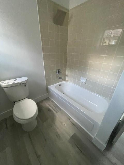 11490 Southwest 148th Court Miami, FL 33196 - Photo 15 of 21 a bathroom with a toilet and a bathtub