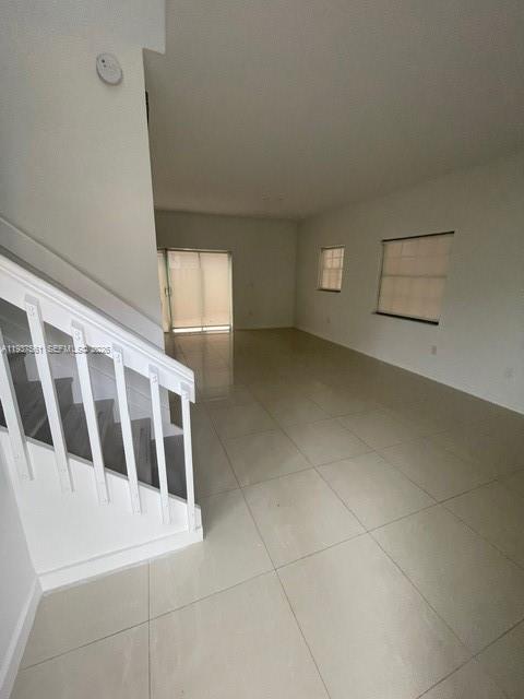 11490 Southwest 148th Court Miami, FL 33196 - Photo 5 of 21 a view of a hallway with staircase