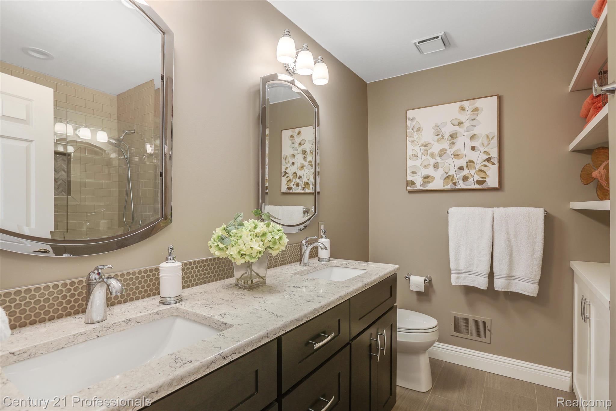 2104 Mapleridge Road Rochester, MI 48309 - Photo 28 of 65 Updated modern bathroom with dual sinks
