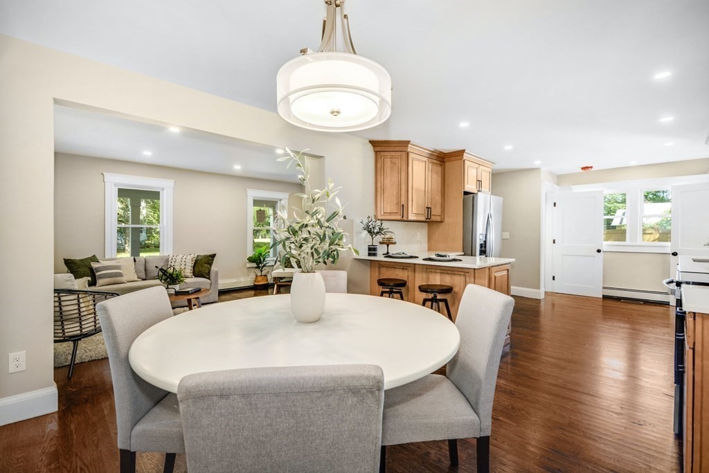 533 Edgell Road Framingham, MA 01701 - Photo 16 of 36 a view of a dining room with furniture and wooden floor