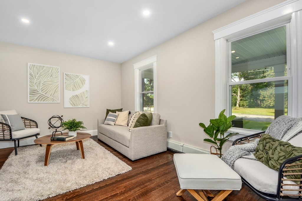 533 Edgell Road Framingham, MA 01701 - Photo 3 of 36 a living room with furniture and a large window