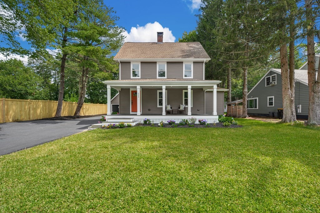 533 Edgell Road Framingham, MA 01701 - Photo 35 of 36 front view of a house with a yard
