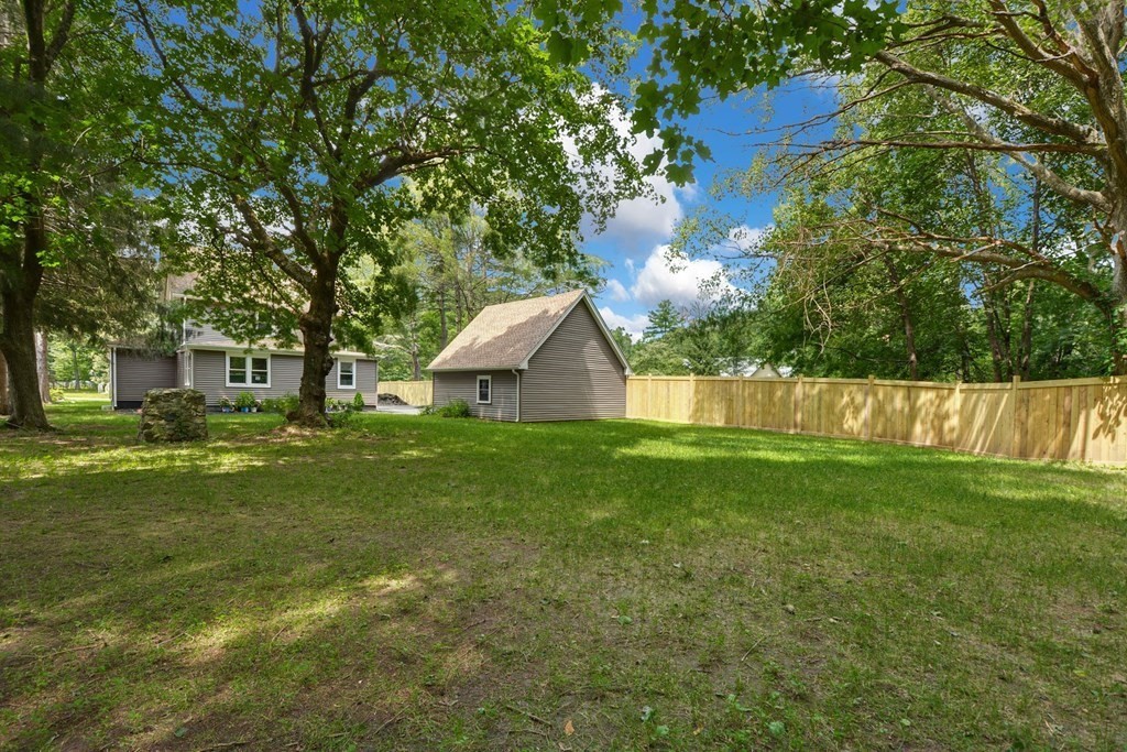 533 Edgell Road Framingham, MA 01701 - Photo 7 of 36 a view of a house with a yard