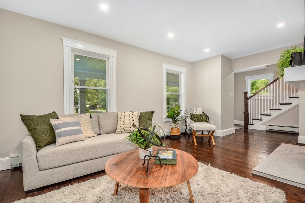 533 Edgell Road Framingham, MA 01701 - Photo 8 of 36 a living room with furniture and a large window