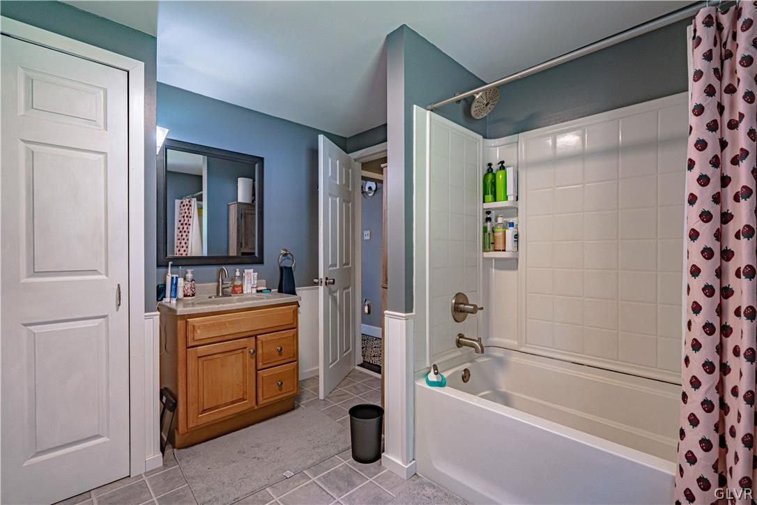 8520 Rextown Road Slatington, PA 18080 - Photo 23 of 40 a bathroom with a tub a sink and a shower