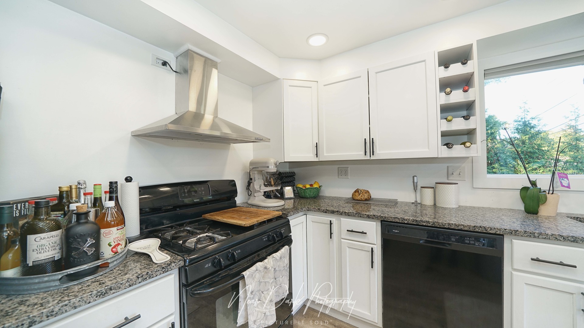 34966 North Forest Avenue Ingleside, IL 60041 - Photo 11 of 46 a kitchen with granite countertop a stove sink and cabinets