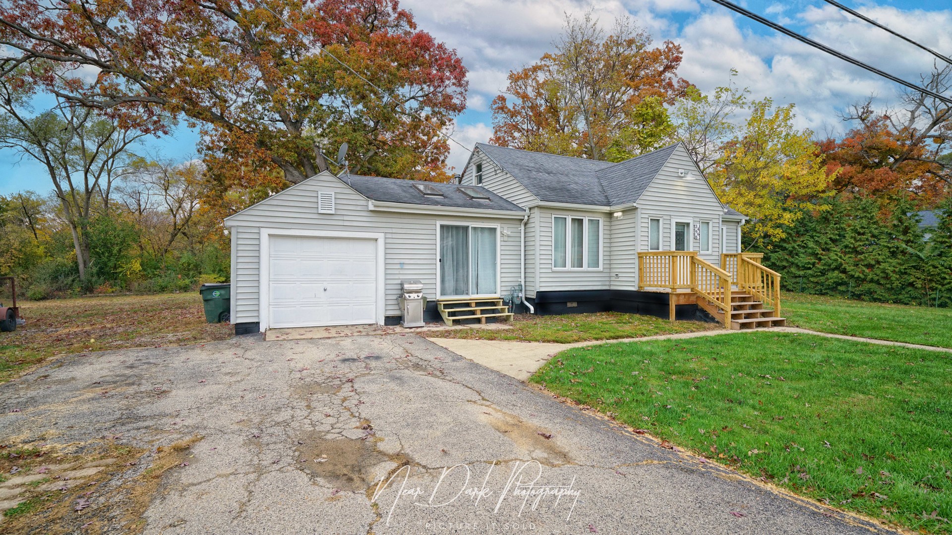 34966 North Forest Avenue Ingleside, IL 60041 - Photo 2 of 46 a view of a house with a yard and large tree