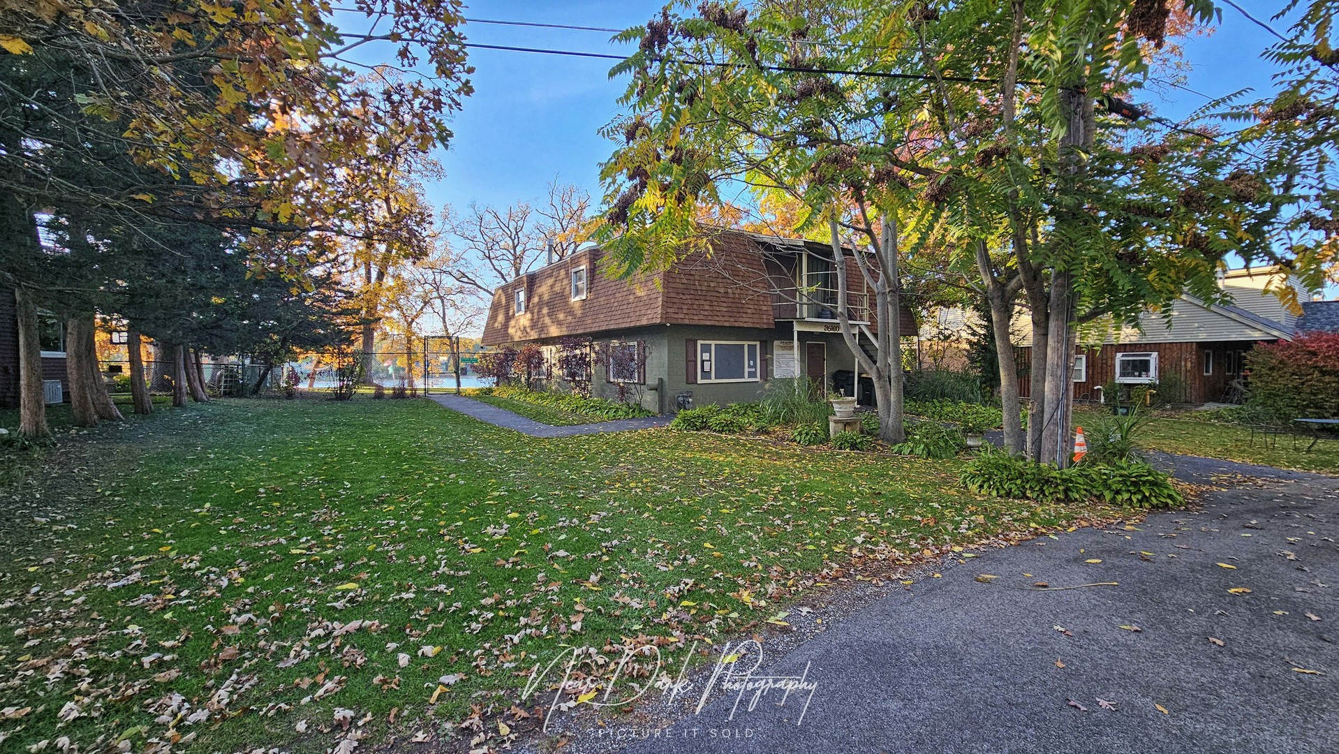 34966 North Forest Avenue Ingleside, IL 60041 - Photo 30 of 46 a front view of a house with garden