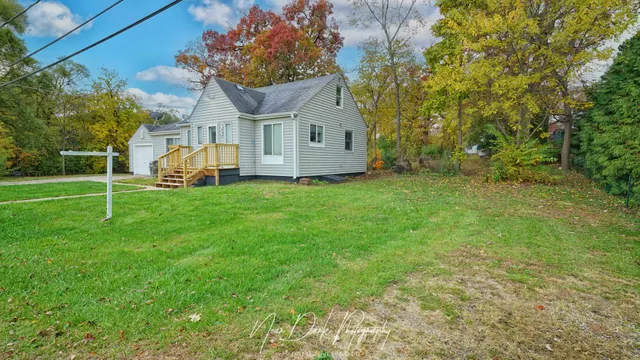 a view of a house with a big yard