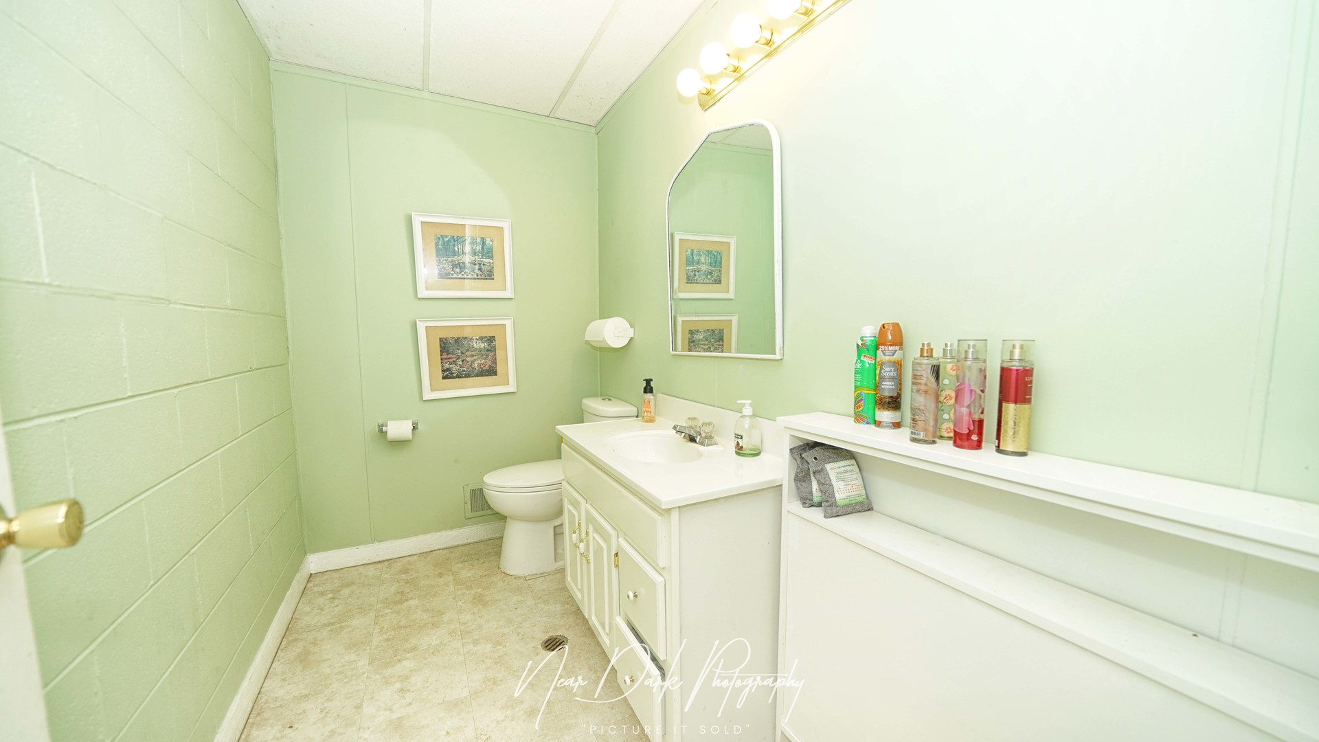 34966 North Forest Avenue Ingleside, IL 60041 - Photo 36 of 46 a en suite bathroom with a sink and a mirror