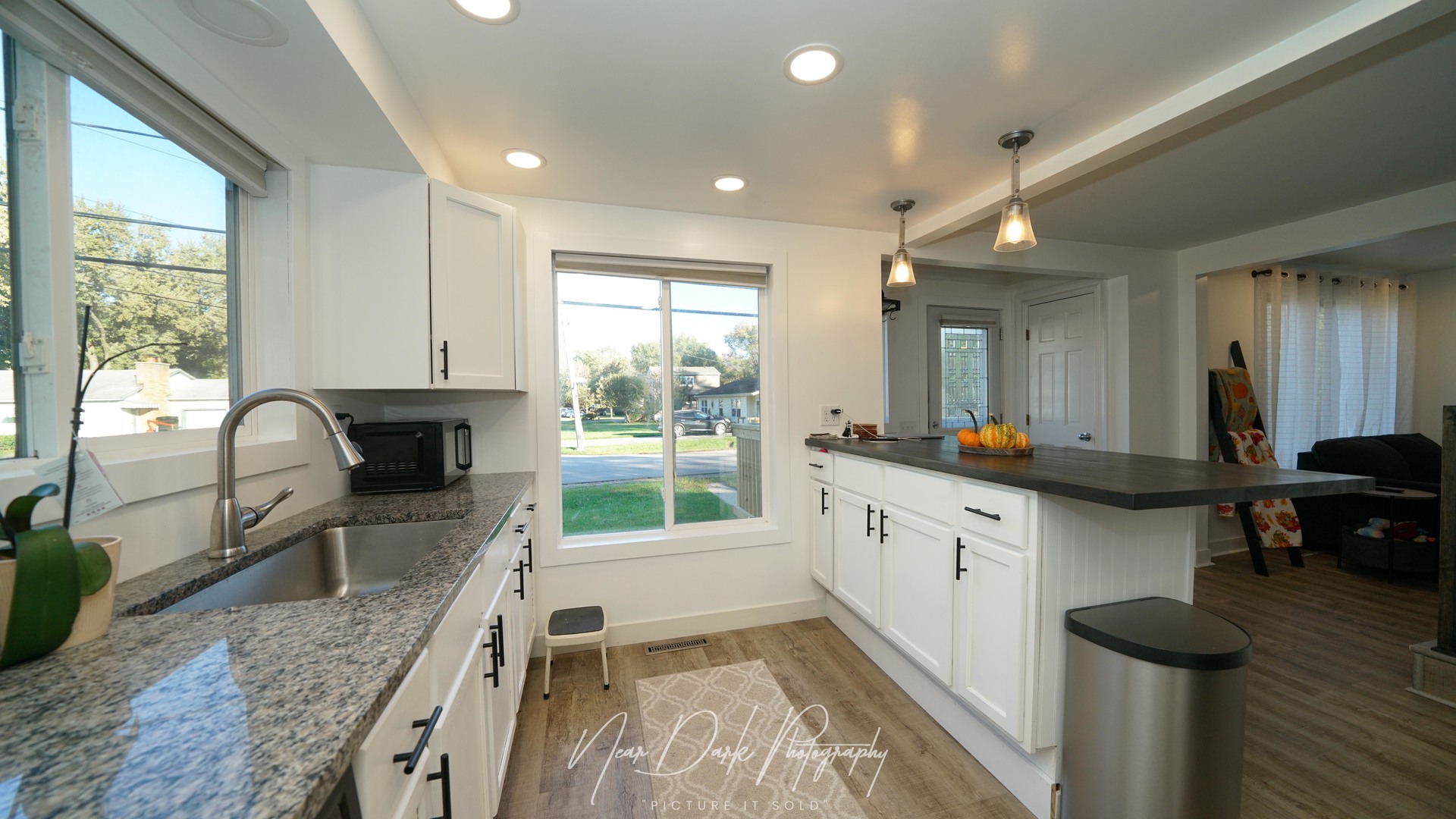 34966 North Forest Avenue Ingleside, IL 60041 - Photo 10 of 46 a kitchen with sink a counter and cabinets