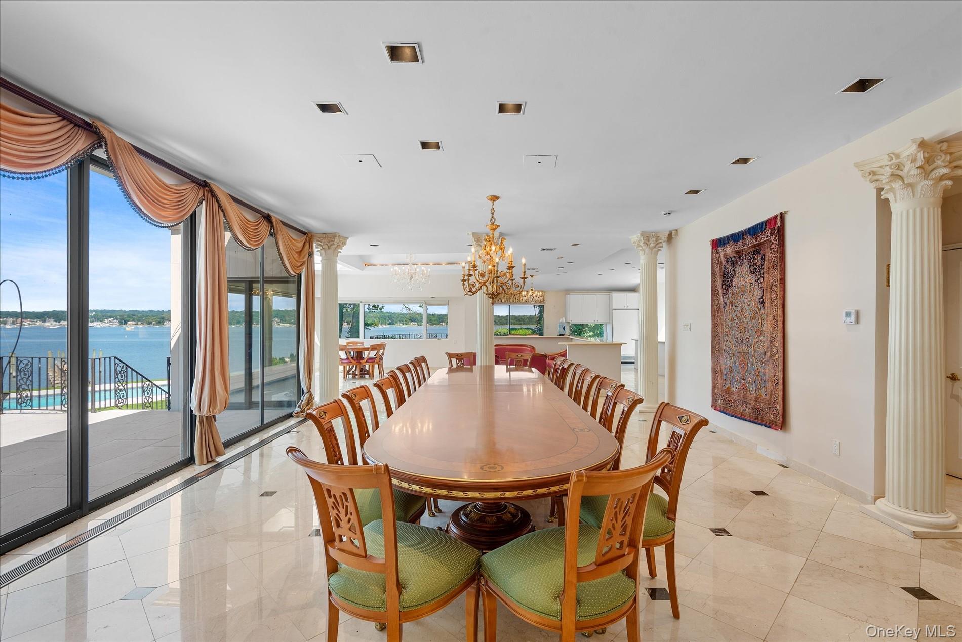 512 East Shore Road Great Neck, NY 11024 - Photo 13 of 46 a view of a dining room with furniture window and outside view