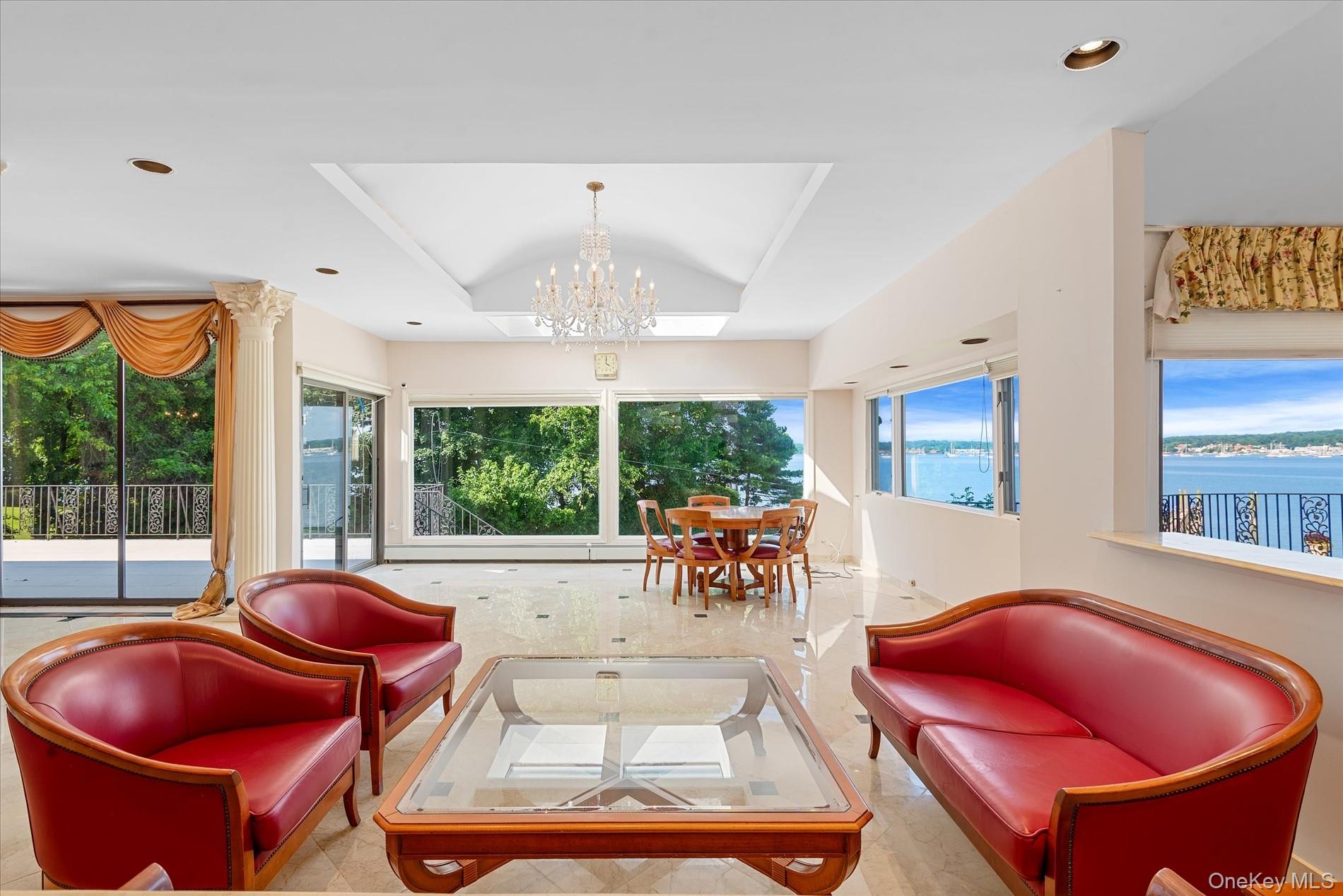 512 East Shore Road Great Neck, NY 11024 - Photo 15 of 46 a room with furniture and a potted plant