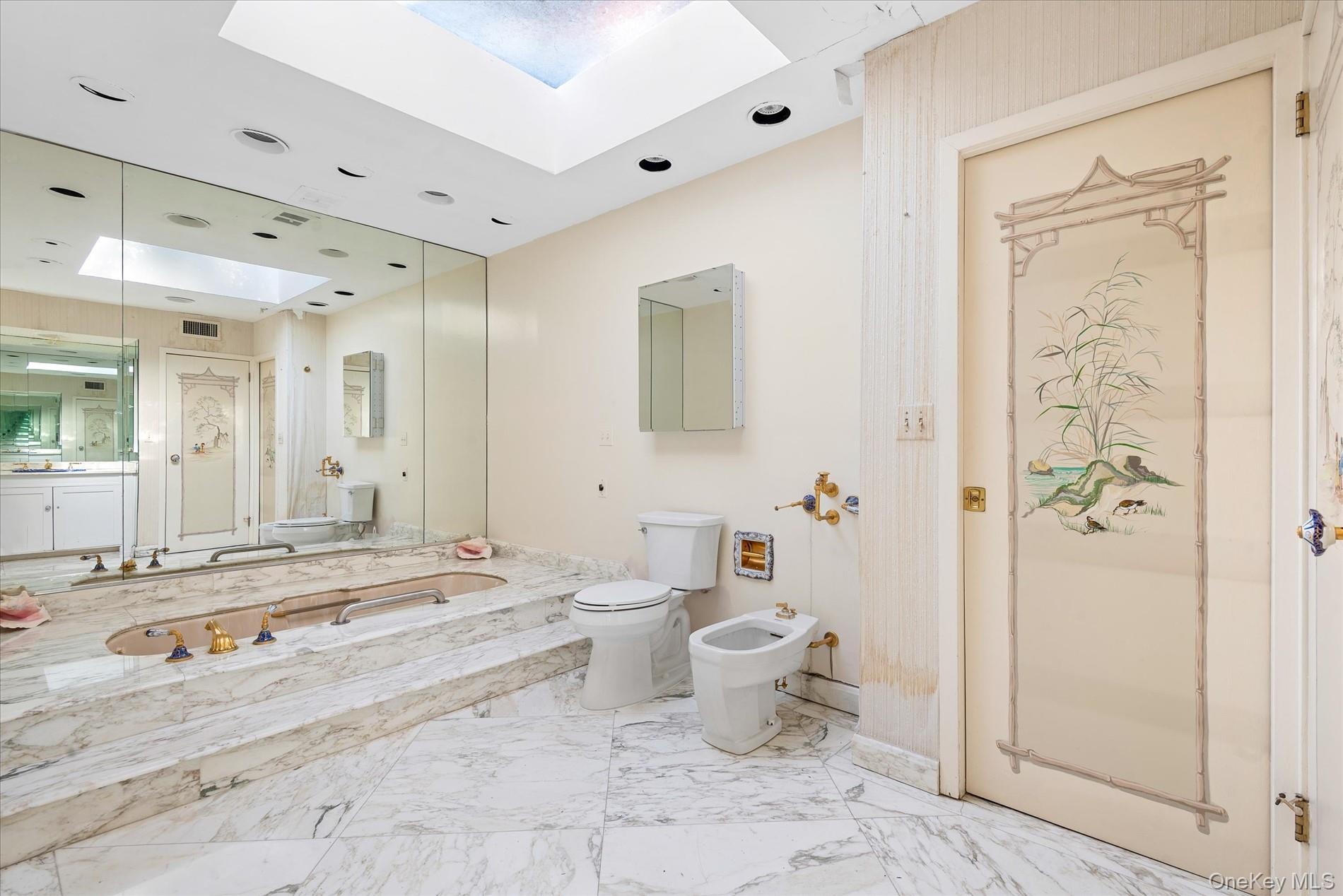 512 East Shore Road Great Neck, NY 11024 - Photo 29 of 46 a bathroom with a toilet sink and shower