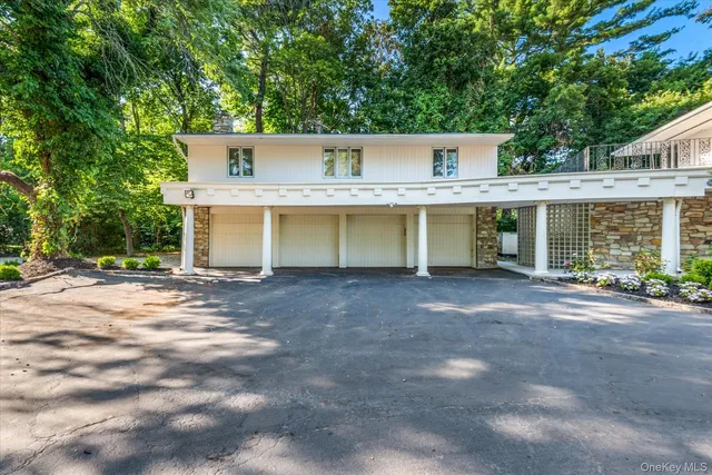 a view of a lake with a house in the background