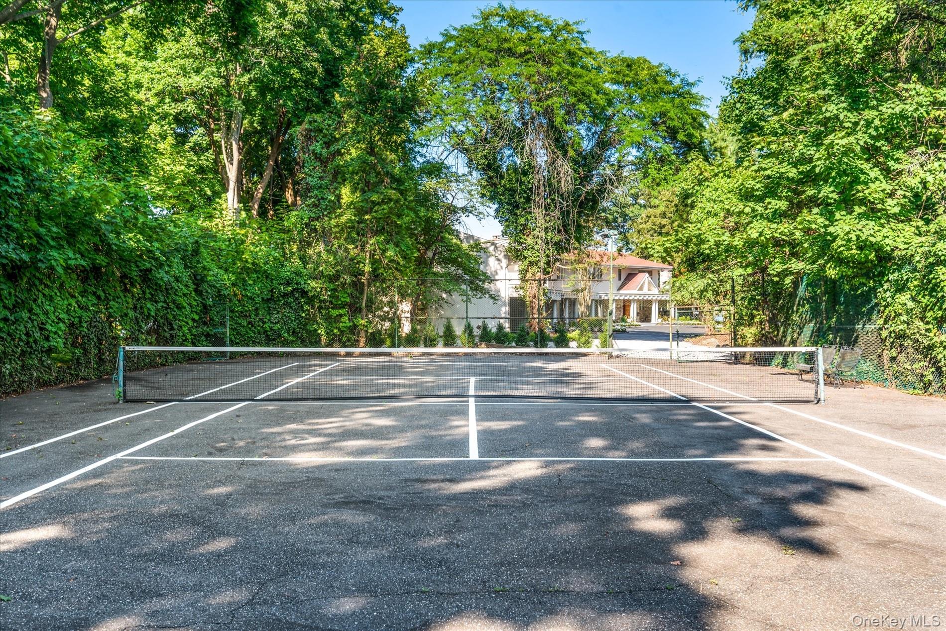 512 East Shore Road Great Neck, NY 11024 - Photo 7 of 46 a view of yard with trampoline