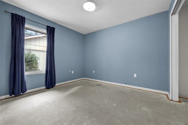 an empty room with windows