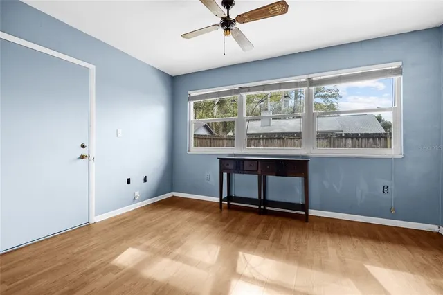 a view of an empty room with a window