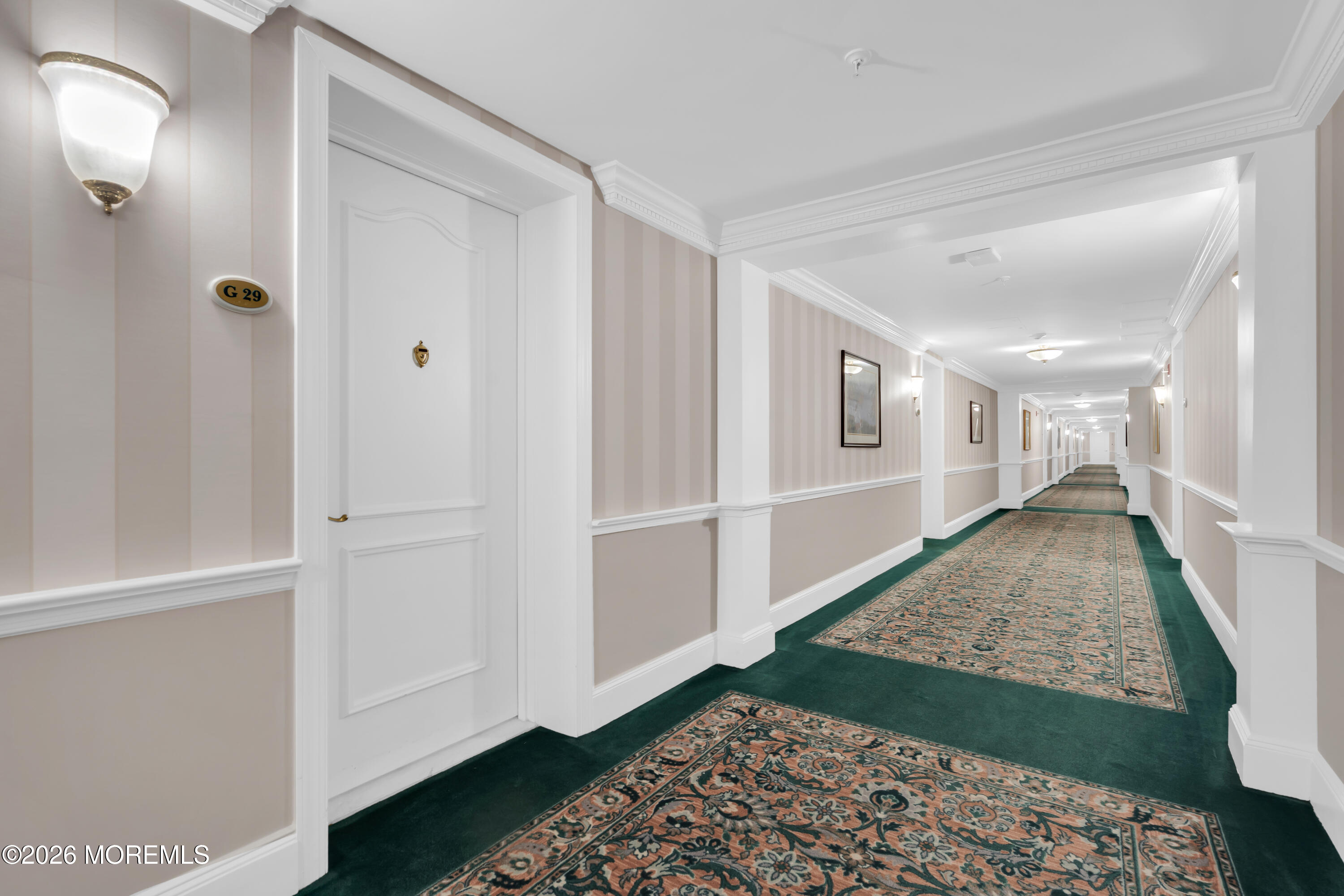 700 Ocean Avenue, Unit G29 Spring Lake, NJ 07762 - Photo 11 of 25 a view of entryway with bedroom and wooden floor