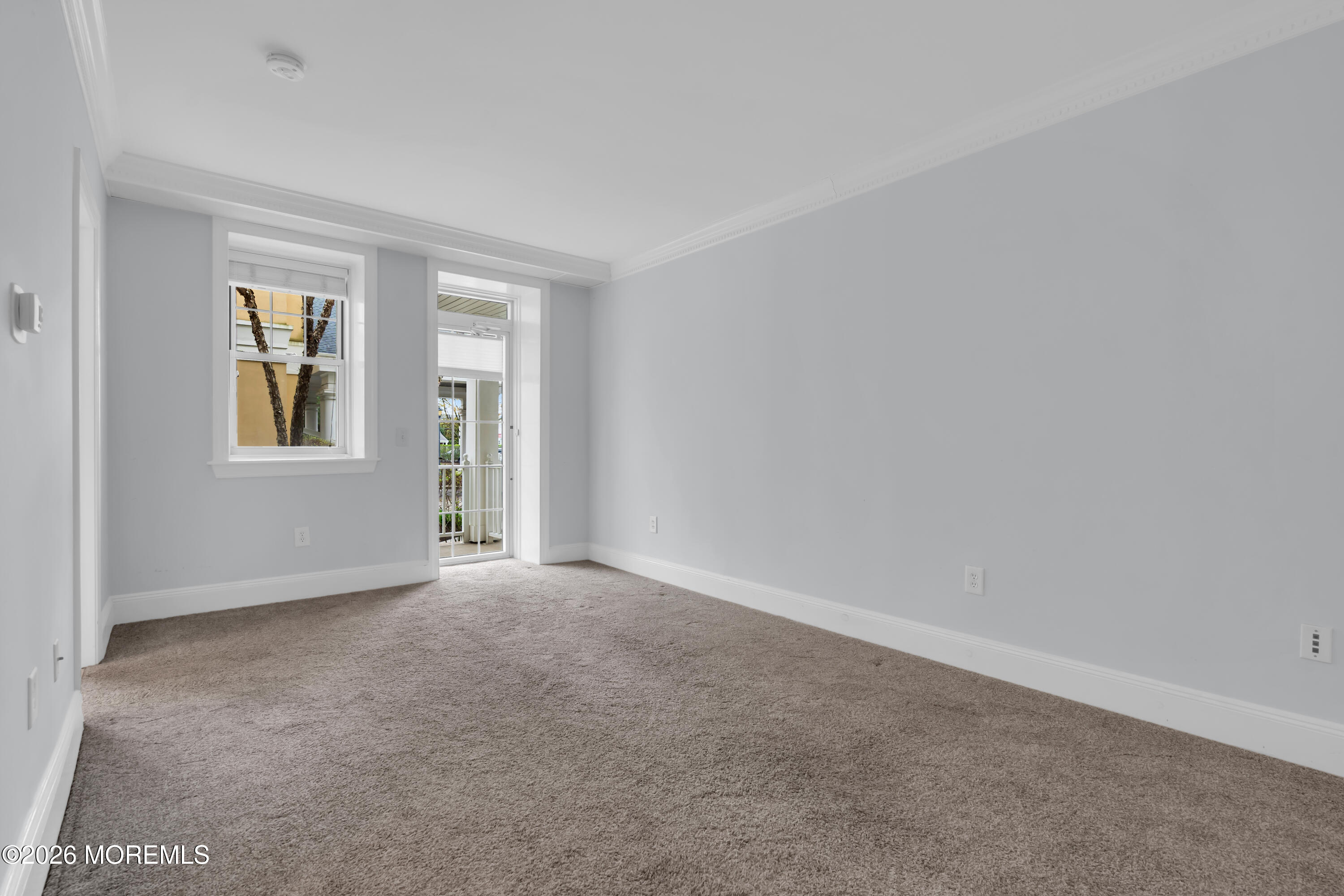 700 Ocean Avenue, Unit G29 Spring Lake, NJ 07762 - Photo 15 of 25 a view of an empty room with a window