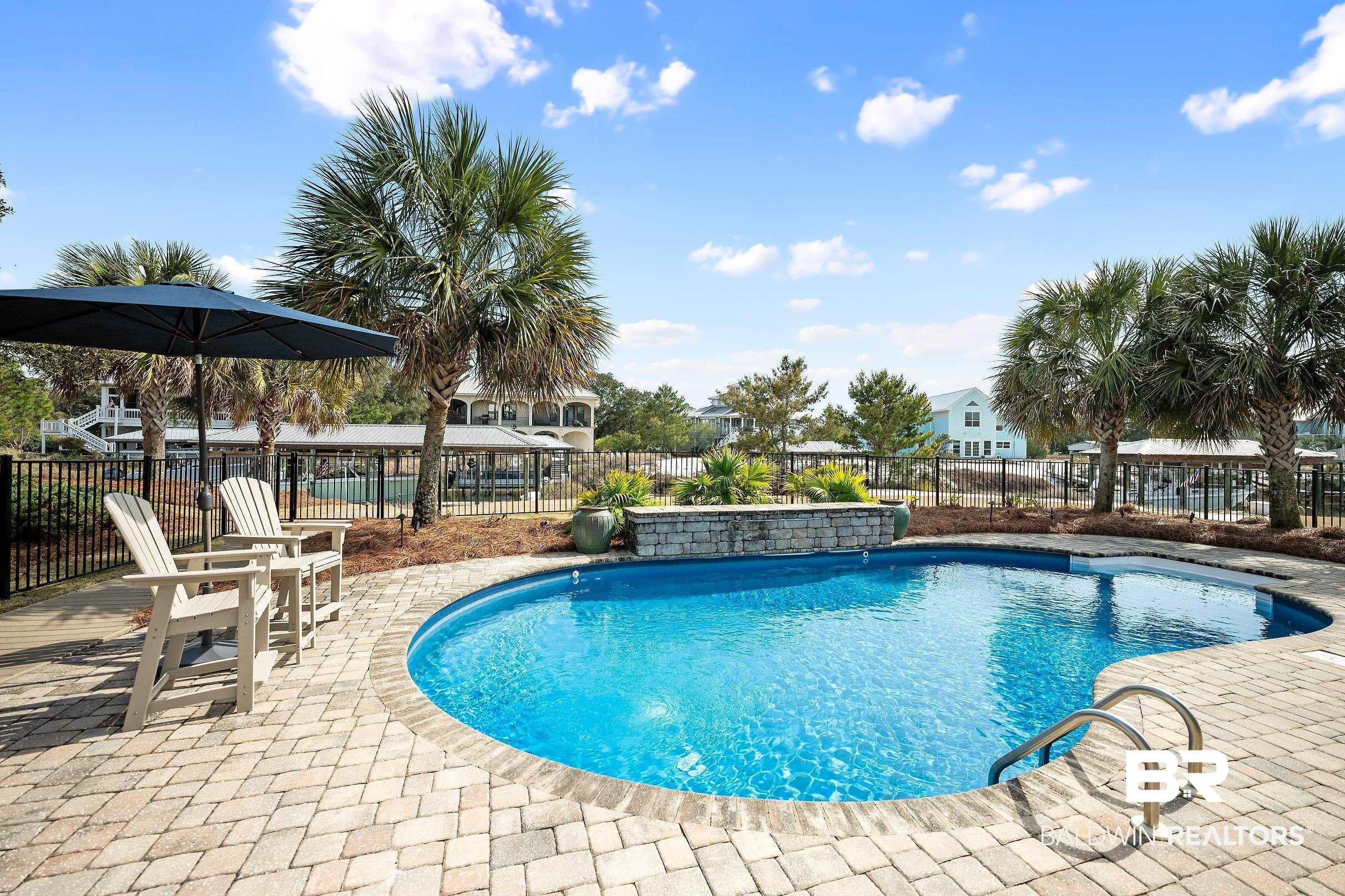 33186 Marlin Key Drive Orange Beach, AL 36561 - Photo 12 of 87 View of swimming pool with patio surround