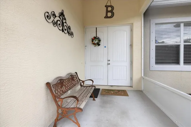 a view of a hardwood floor and a ceiling fan