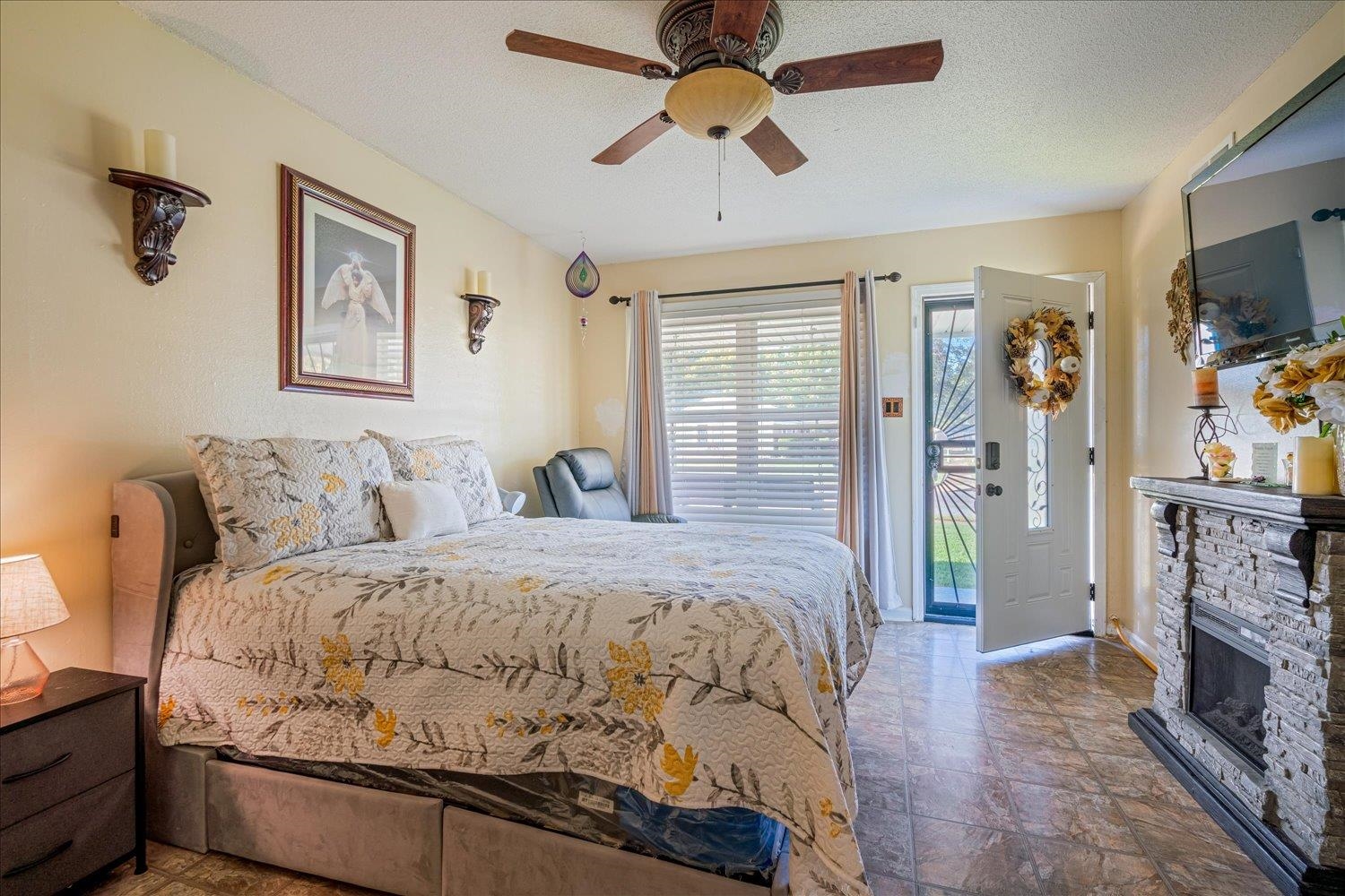 4340 Bluebell Street Memphis, TN 38109 - Photo 17 of 29 a bed room with a bed and a television