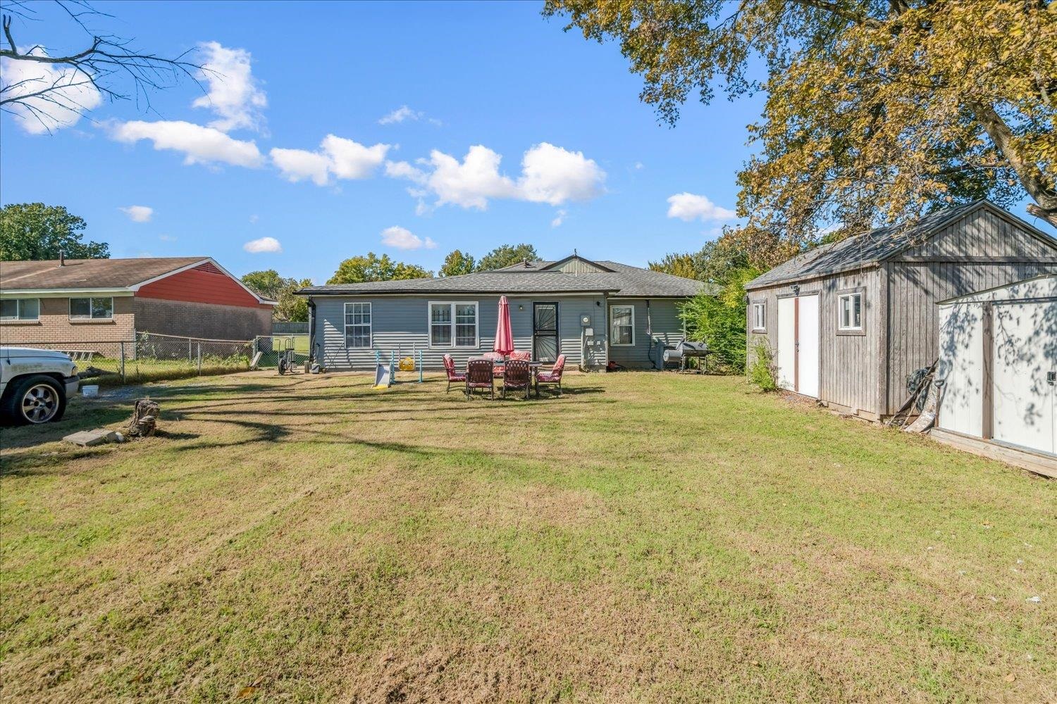 4340 Bluebell Street Memphis, TN 38109 - Photo 2 of 29 Rear view of house featuring a shed