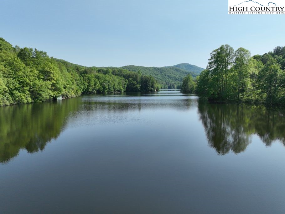 1776 Ripshin Mountain Road Roan Mountain, TN 37687 - Photo 22 of 30 a view of a lake with houses