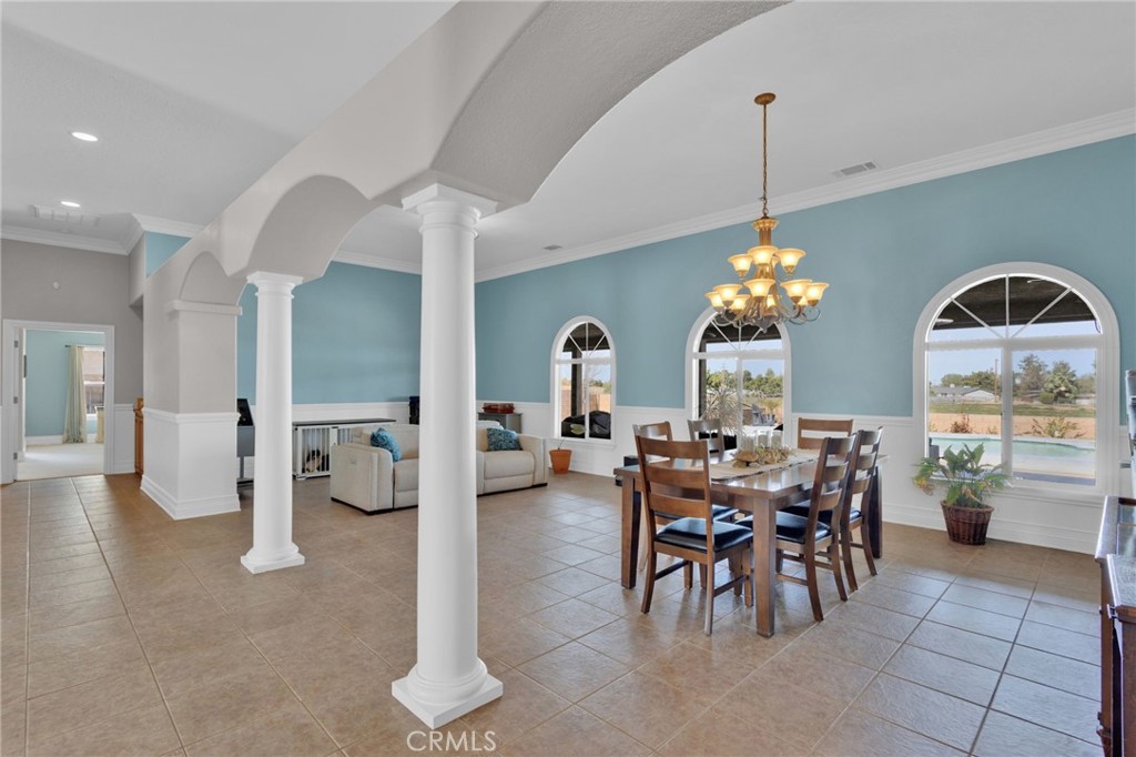 12290 Larch Road Oak Hills, CA 92344 - Photo 14 of 75 a view of a livingroom with furniture and window