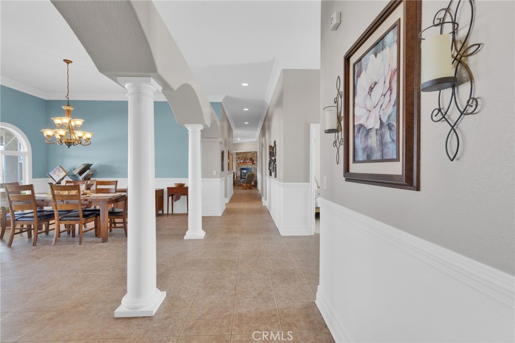 12290 Larch Road Oak Hills, CA 92344 - Photo 16 of 75 a view of a livingroom with furniture and entryway