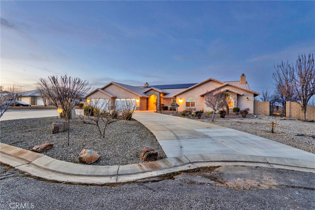 12290 Larch Road Oak Hills, CA 92344 - Photo 2 of 75 a houses view with a outdoor space