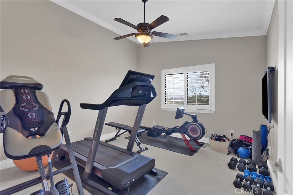 12290 Larch Road Oak Hills, CA 92344 - Photo 45 of 75 a living room with furniture and a window
