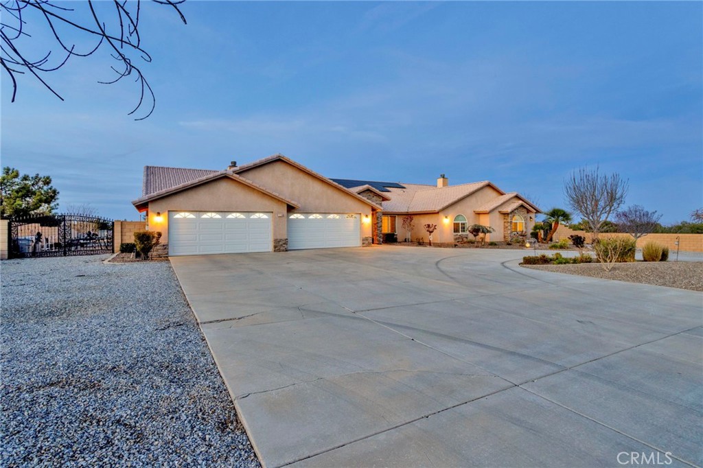 12290 Larch Road Oak Hills, CA 92344 - Photo 70 of 75 a view of house with outdoor space
