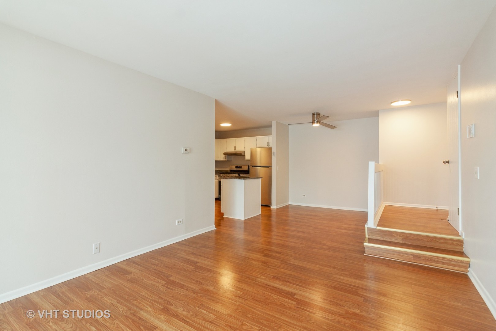 1352 McDowell Road, Unit 103 Naperville, IL 60563 - Photo 8 of 12 a view of kitchen with wooden floor