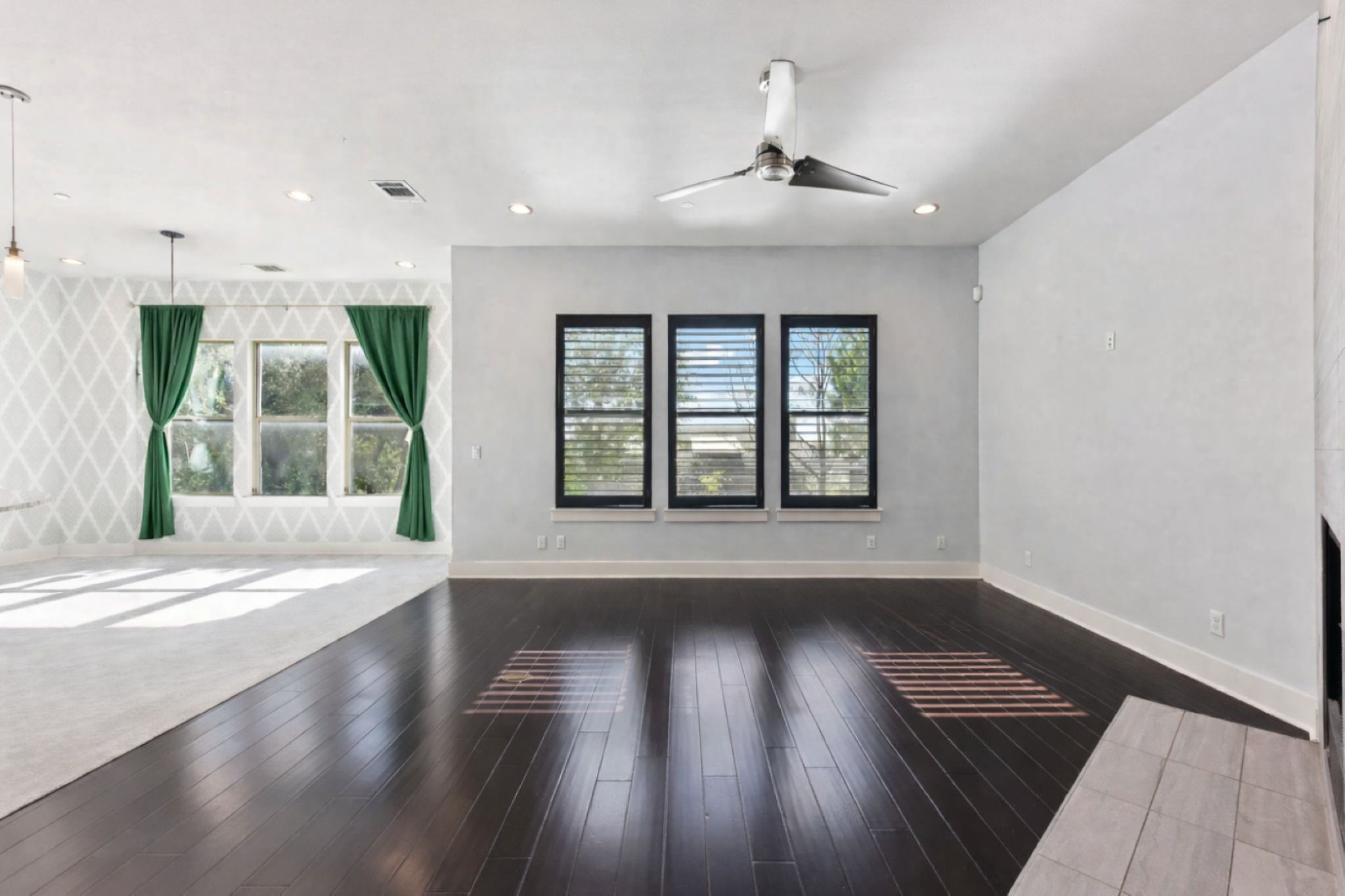 8110 Ranch Road 2222, Unit 98 Austin, TX 78730 - Photo 5 of 37 Spare room featuring plenty of natural light, ceiling fan, hardwood / wood-style flooring, and recessed lighting