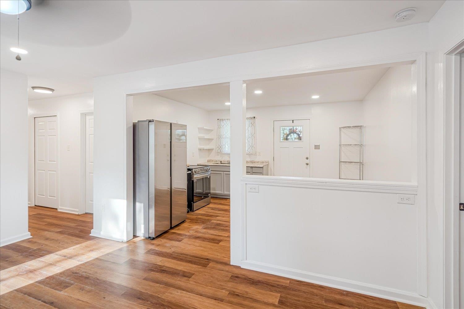 8371 McCalla Road Millington, TN 38053 - Photo 18 of 27 Kitchen featuring stainless steel appliances, light wood-type flooring, recessed lighting, and open shelves