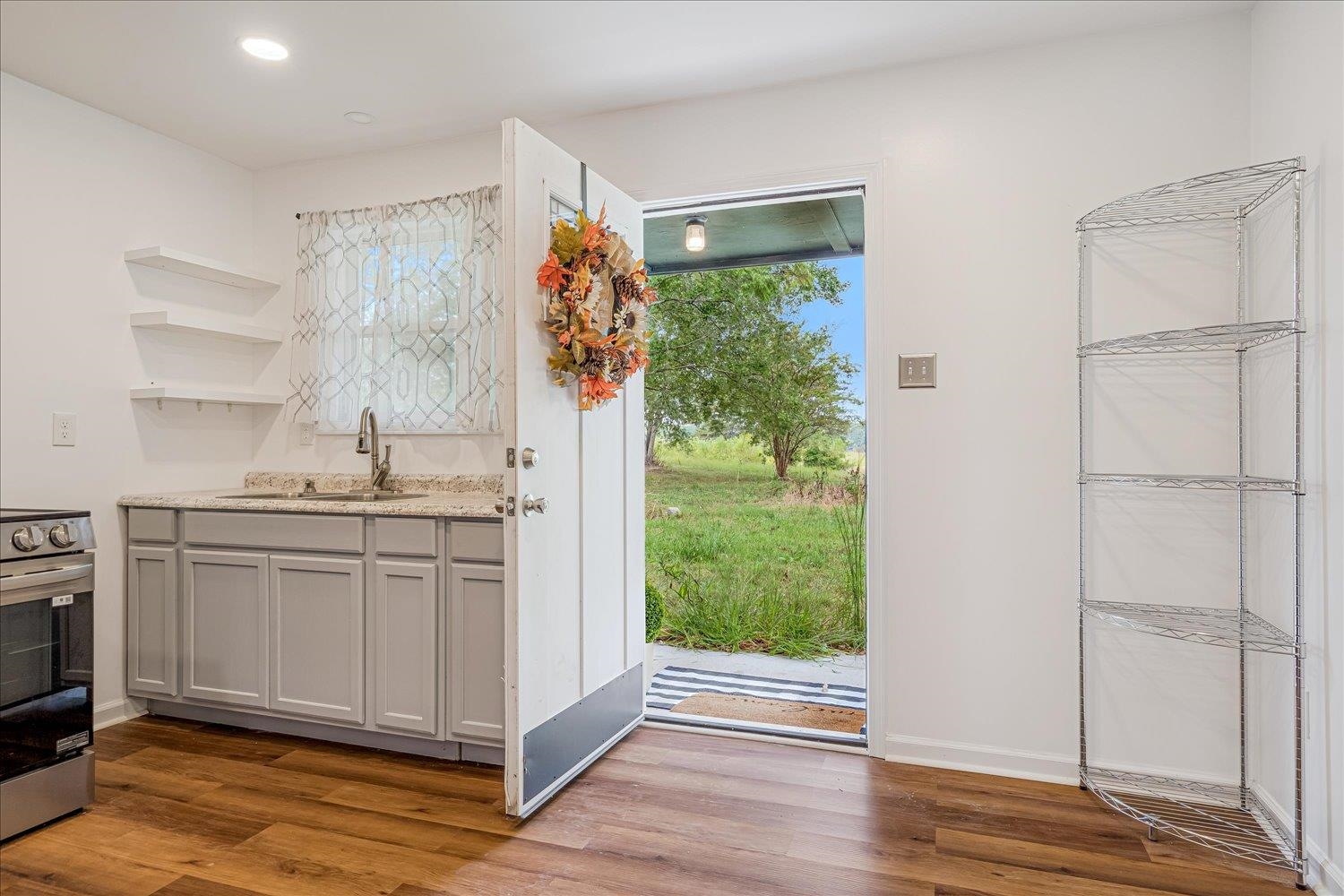 8371 McCalla Road Millington, TN 38053 - Photo 5 of 27 Kitchen with open shelves, gray cabinets, dark wood-style floors, electric range, and recessed lighting
