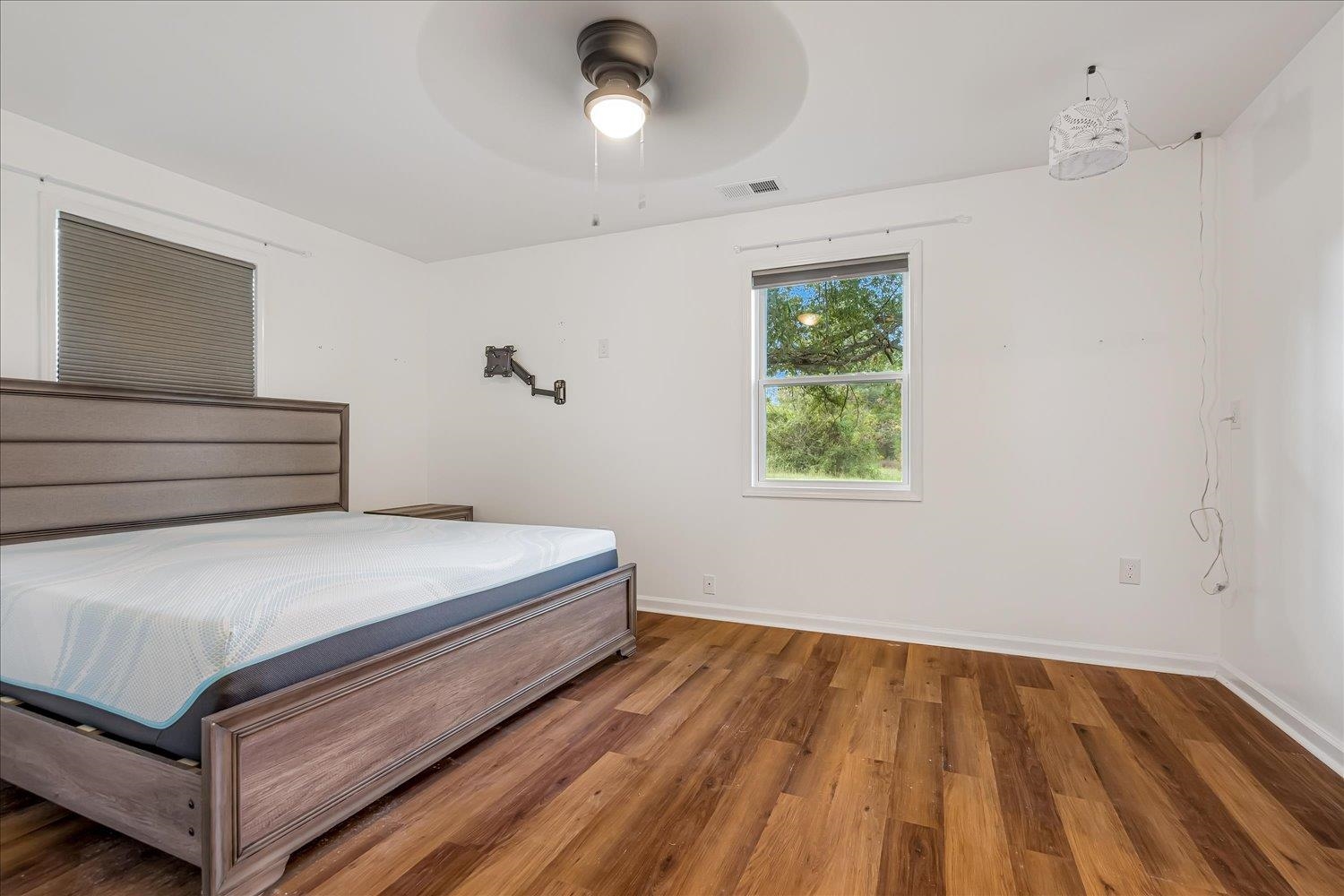 8371 McCalla Road Millington, TN 38053 - Photo 10 of 27 Bedroom featuring wood finished floors and a ceiling fan