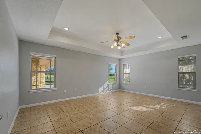 a view of an empty room and window