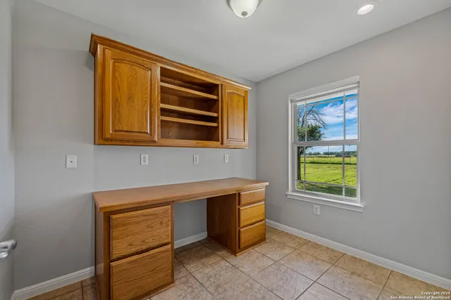 a hallway with washer and dryer