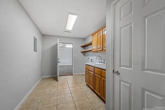 a view of an empty room with a window