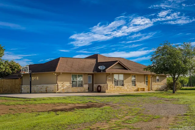 a view of a house with a patio